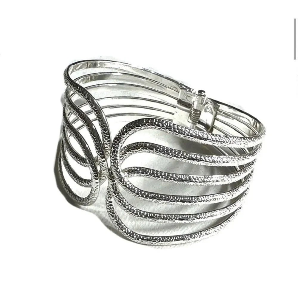 Silver tone textured hinged wide bracelet